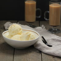 Eggnog Ice Cream in bowl with coffee in mugs