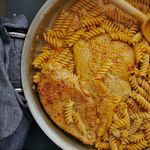 fusilli chicken pasta in pan with chicken