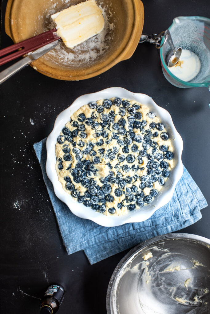 blueberries pressed into butter dough