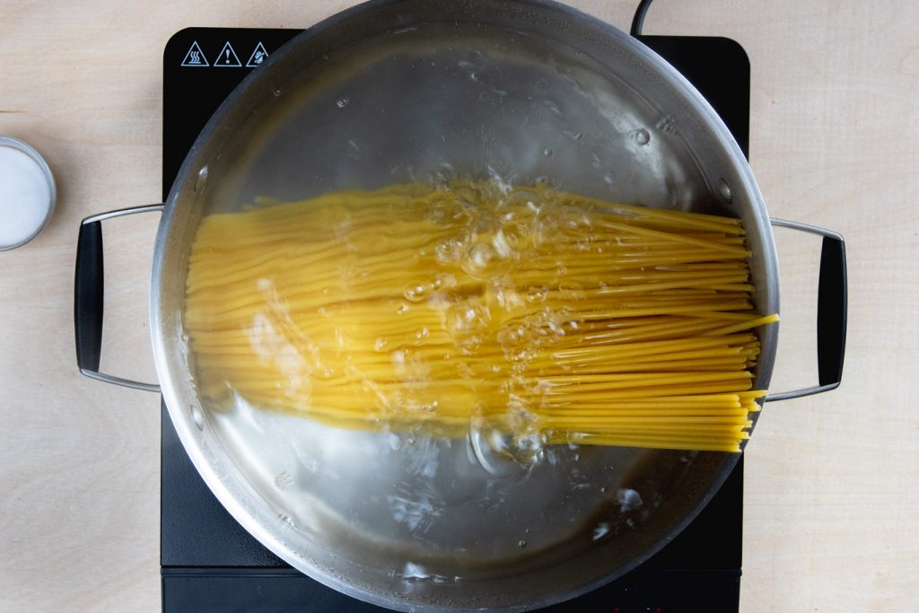 Bucatini in boiling water