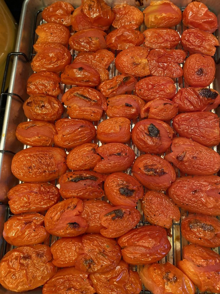 Roma tomatoes roasted until blistered