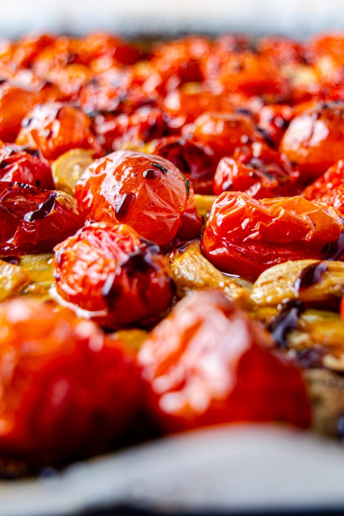 cherry tomatoes on a roasting sheet pan tray