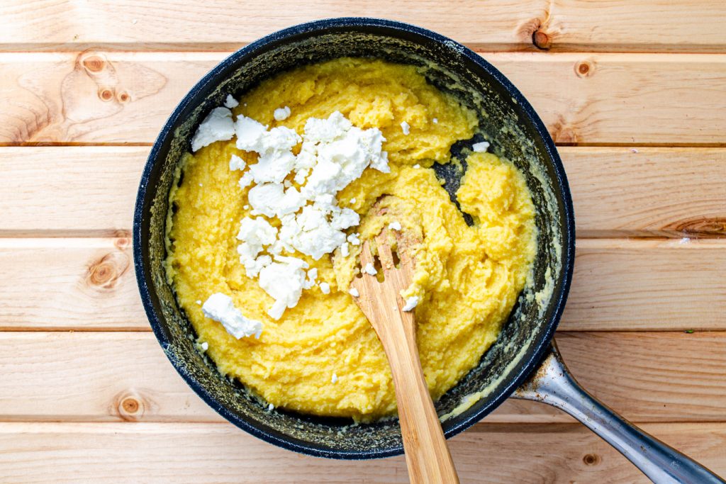 polenta in a pot with goat cheese