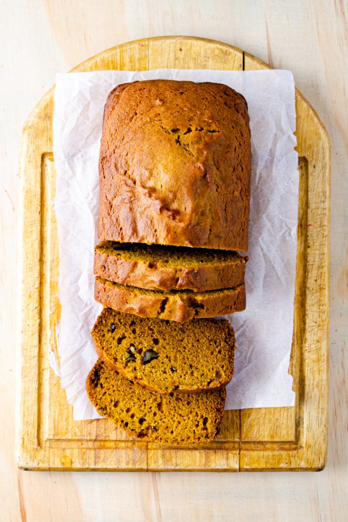 loaf of pumpkin bread on cutting board