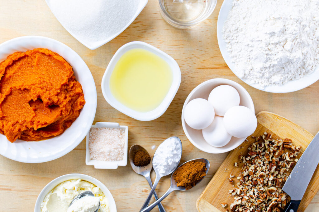 canned pumpkin, sugar, flour, oil, eggs, cinnamon, cloves, pecans, and salt