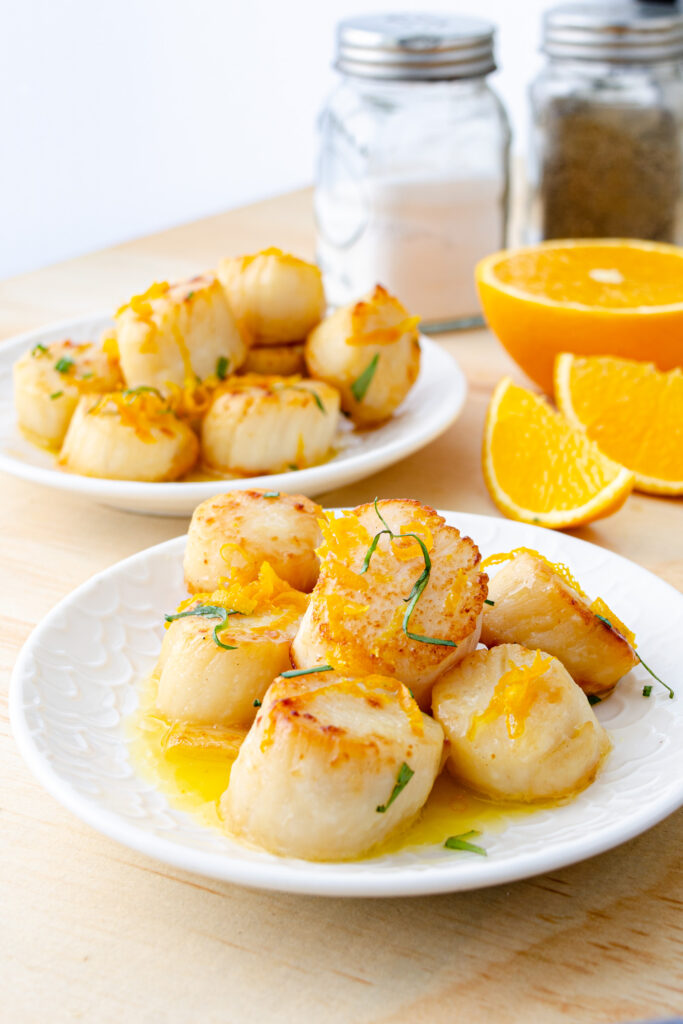 baked scallops with fresh orange, lemon, and ginger sauce