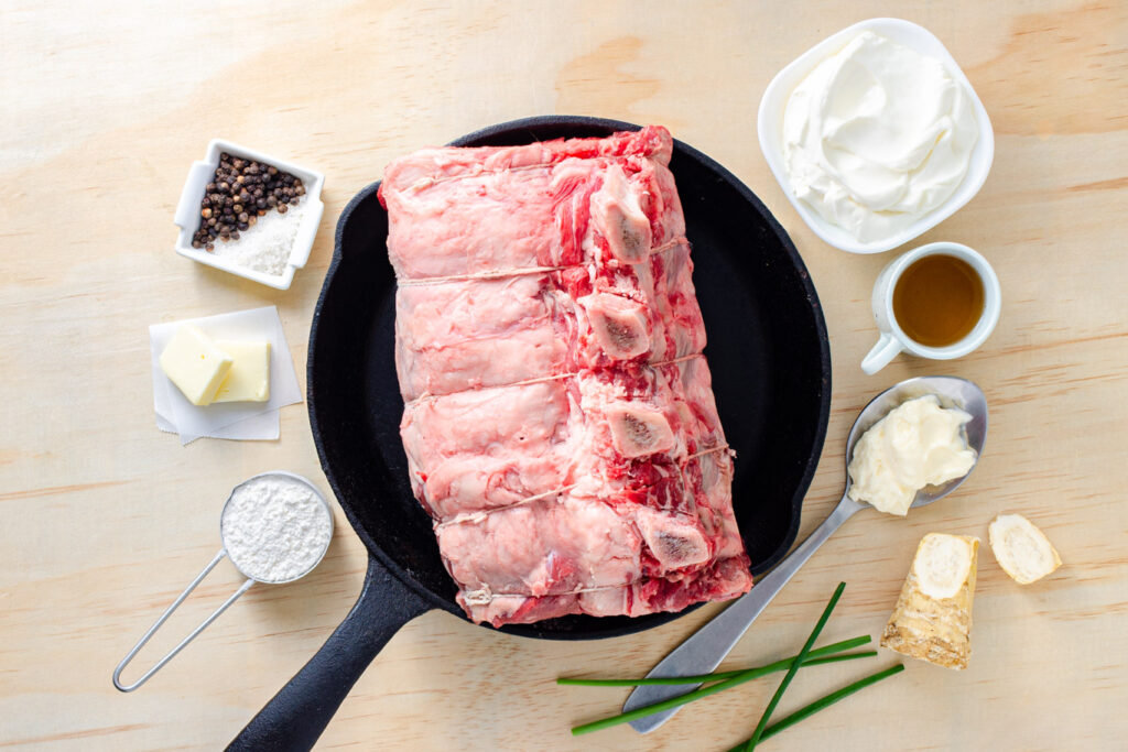 Kosher salt and pepper, butter, flour, and a tied prime rib roast ingredients