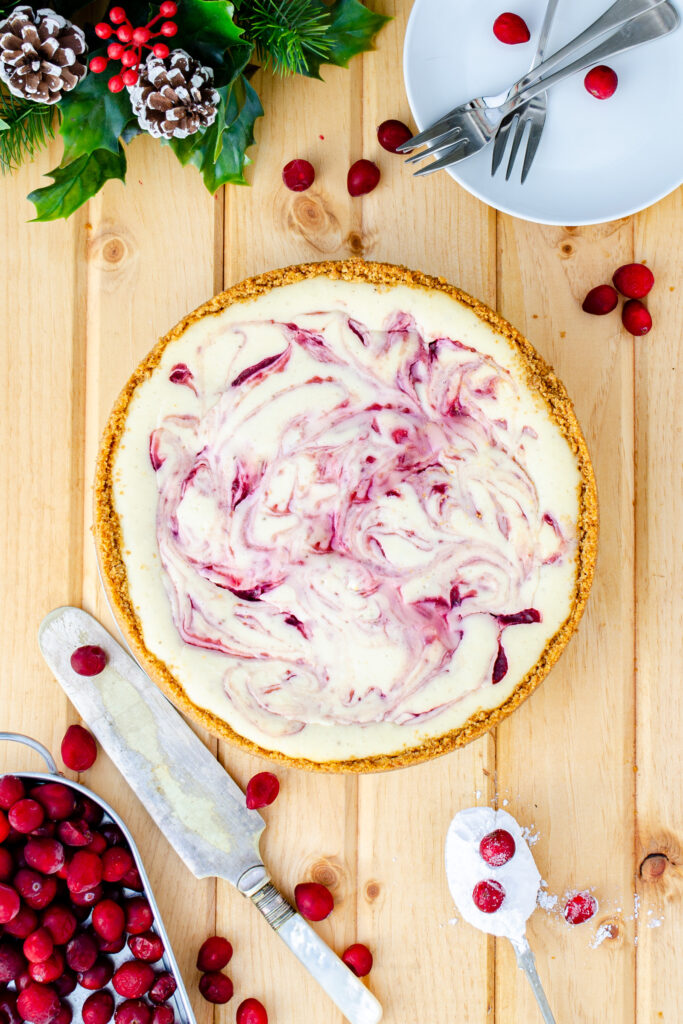 cheesecake with a cranberry swirl topping