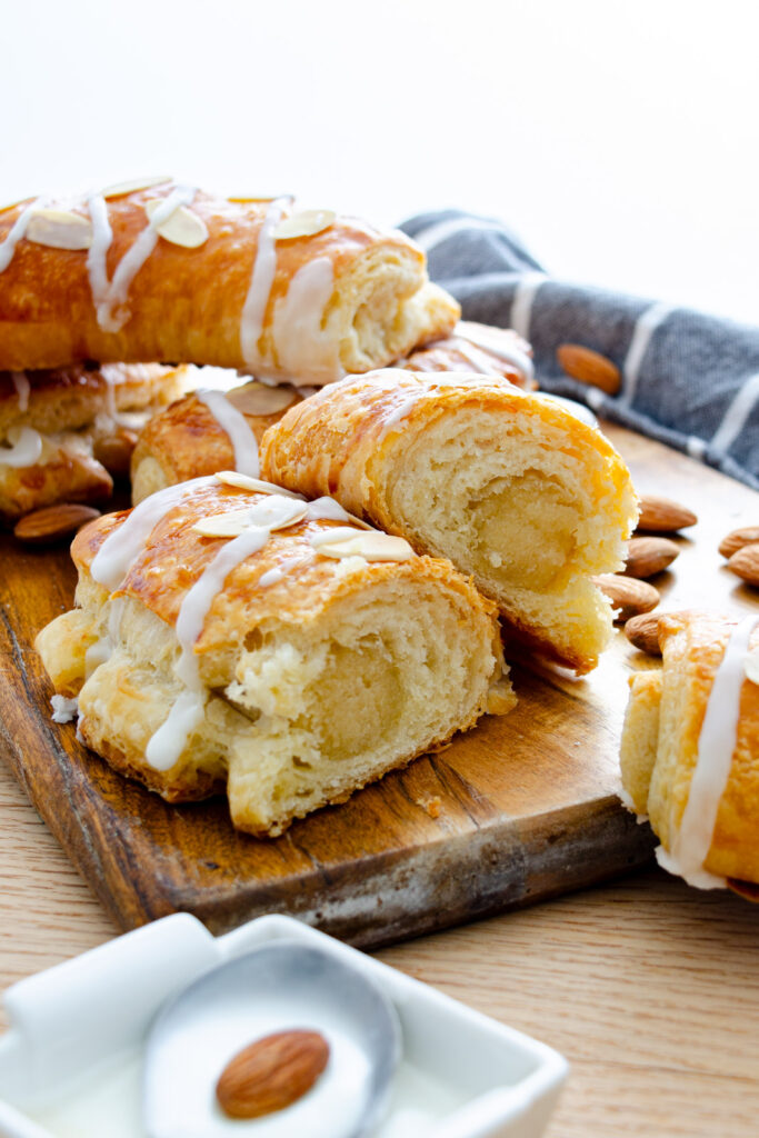 bear claw pastry cut in half with sweet almond filling