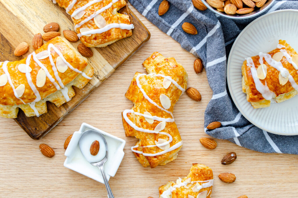 almond bear claws pastries with slivered almonds and glaze