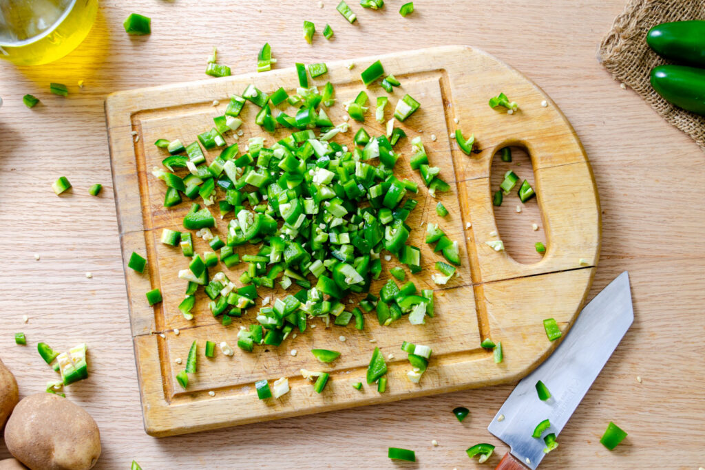 jalapeno minced on cutting board