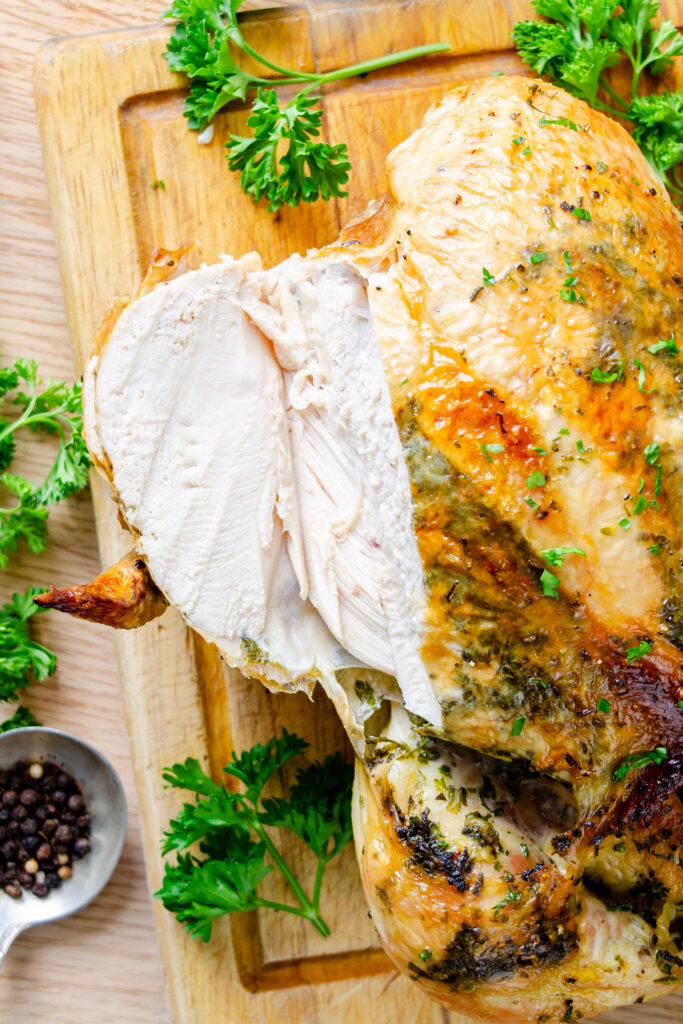 juicy chicken on carving board