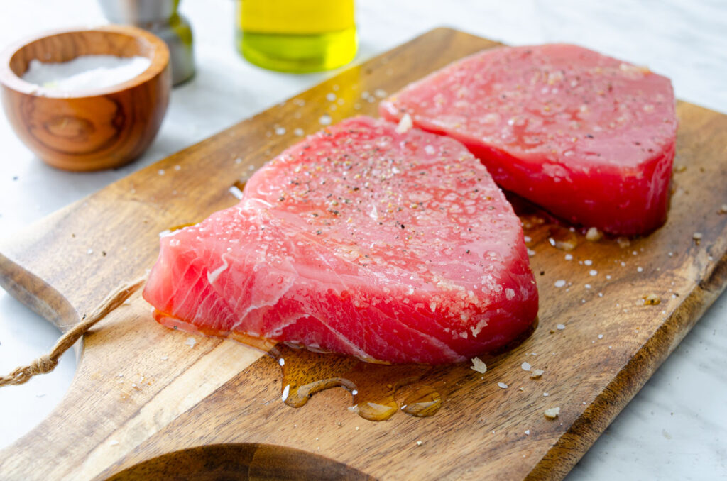 fresh raw tuna seasoned with salt and pepper