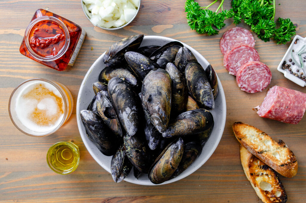 sun dried tomato, beer, olive oil, onion, sopressata, black mussels, parsley, salt and pepper, bread for serving