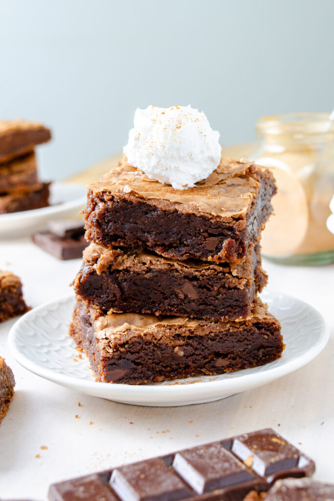 gluten-free brownies stacked on a plate