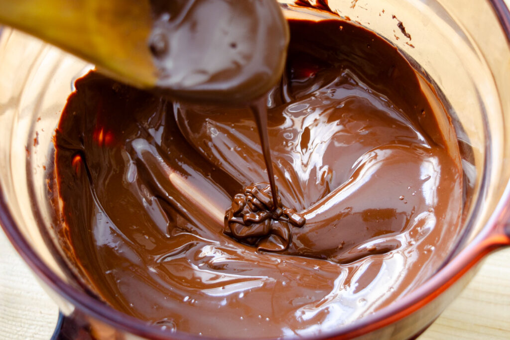 dark chocolate in double boiler mixed with oil