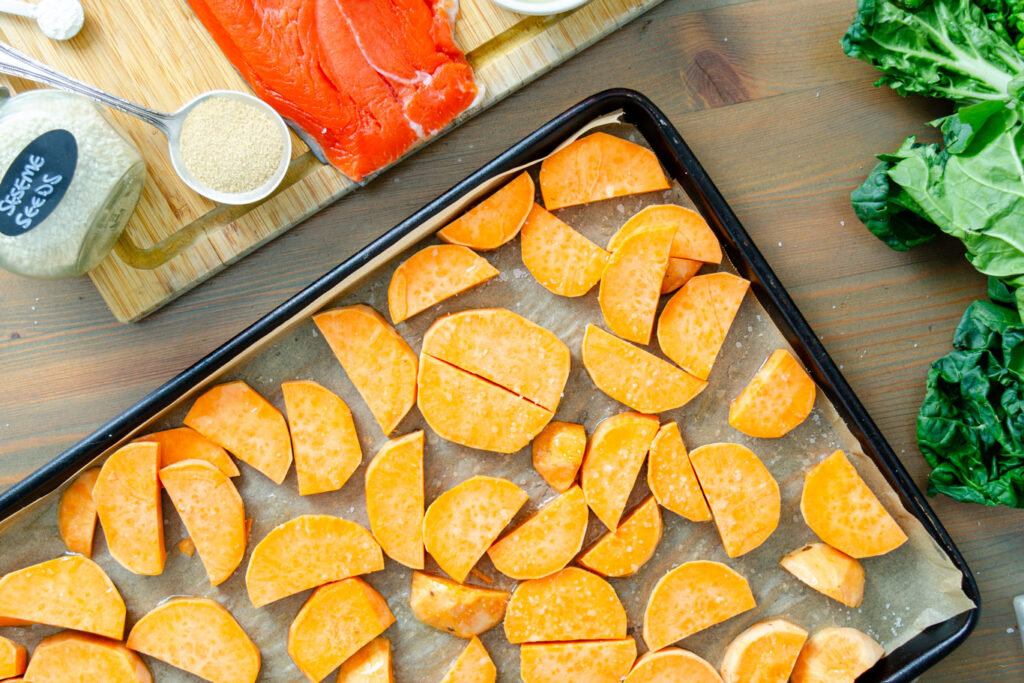 sweet potato wedges on sheet tray