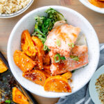 sheet pan salmon and veggies served in a bowl