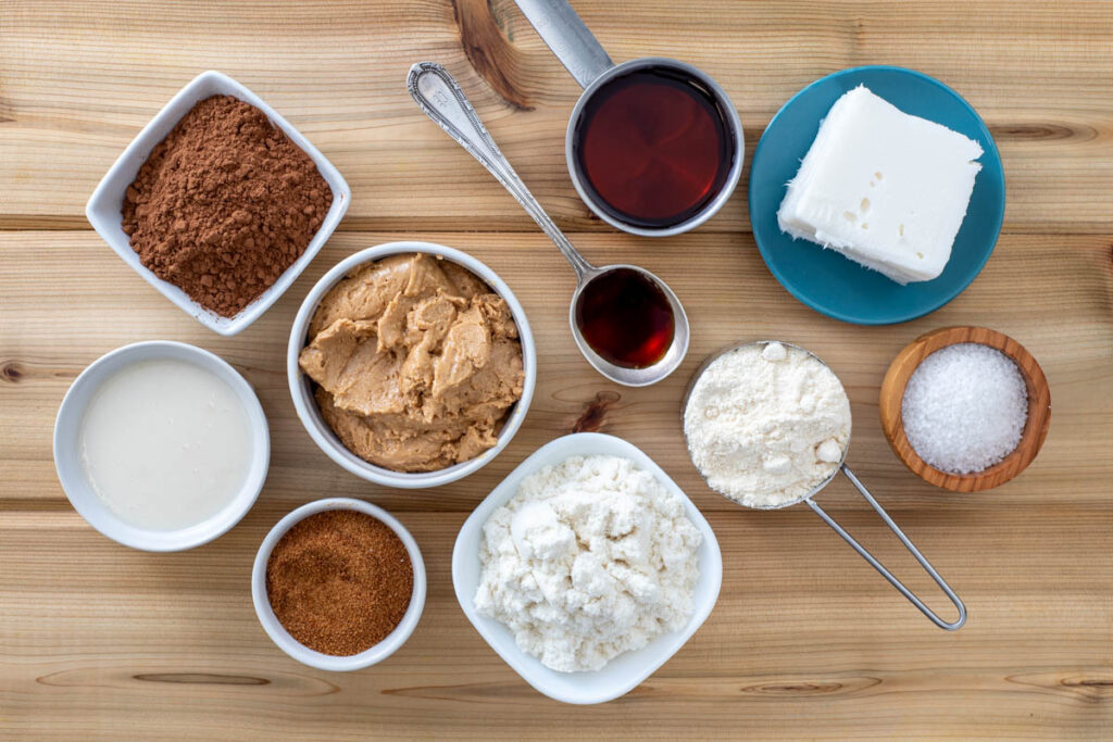 peanut butter, coconut oil, cocoa, maple syrup, protein powder, coconut flour, salt, vanilla extract measured