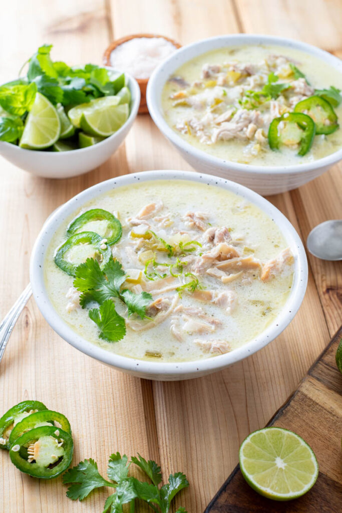 creamy chicken soup with fresh jalapeno chiles on top